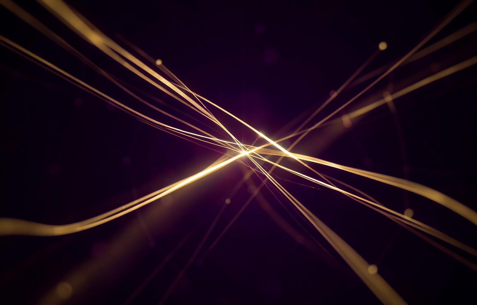 Lines of light converging in darkness